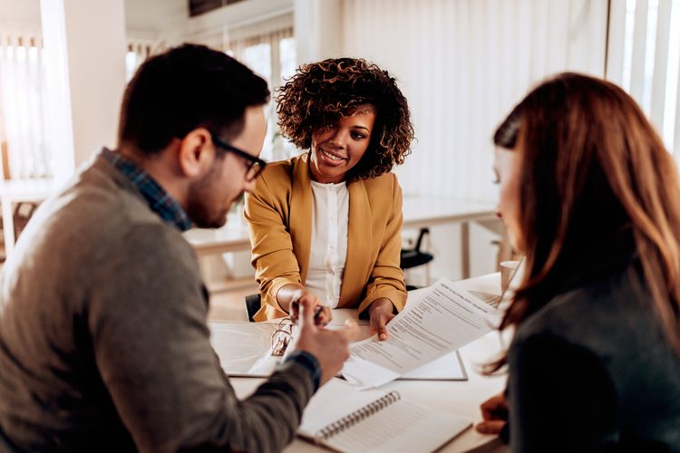 People reviewing paperwork